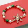 Fashnzfab Stone Paved Snowflake Charm Holiday Pearl Beaded Stretch Bracelet Gold, Multi In Multi