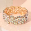 Fashnzfab Stone Paved Wavy Stretch Evening Bracelet Ab, Gold In Multi