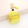 Fashnzfab Studded Backpack Bag Tassel Keychain In Yellow