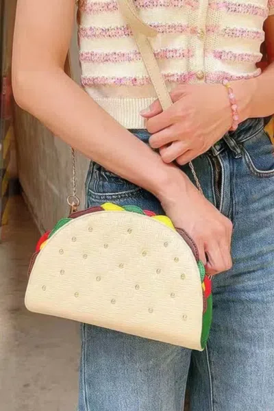 Fashnzfab Studded Taco Shape Clutch In Sand