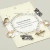 Fashnzfab Teachers Blessing Message Apple Heart Book Charm Station Toggle Bracelet In Gold