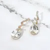 Fashnzfab Teardrop Glass Stone Drop Stone Paved Swirl Evening Earrings In Multi