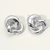 Fashnzfab Textured Metal Knot Clip On Earrings In Metallic