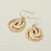 Fashnzfab Textured Metal Knot Dangle Earrings In Gold
