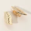Fashnzfab Textured Metal Leaf Clip On Earrings - Gold In Gold