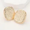 Fashnzfab Textured Metal Pebble Clip On Earrings In Gold