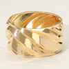Fashnzfab Textured Metal Wide Hinged Bangle Bracelet Gold In Gold