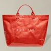 Fashnzfab The Bag Message Print Paper Transparent Paper Top Handle Tote Bag In Red