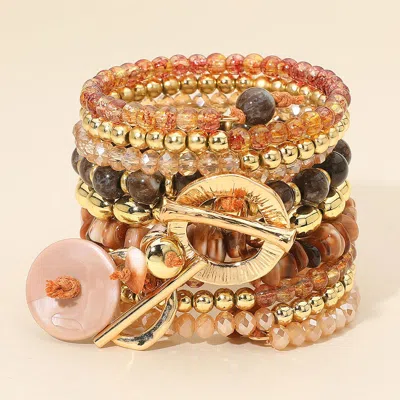 Fashnzfab Toggle Charm Accent Stacked Adjustable Beaded Coil Bracelet - Brown, Gold In Multi
