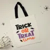 Fashnzfab Trick Or Treat Time Halloween Message Tote Bag In Multi