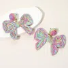 Fashnzfab Twisted Raffia Bow Dangle Earrings In Multi