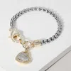 Fashnzfab Two Tone 14k Gold Plated Cz Stone Paved Heart Charm Bracelet Two Tone In Multi