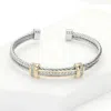 Fashnzfab Two Tone Cz Stone Paved Rope Cuff Bracelet - Two Tone In Metallic