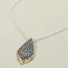 Fashnzfab Two Tone Metal Intricate Artisan Leaf Pendant Necklace In Gold