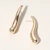 Fashnzfab Wavy Long Teardrop Earrings In Gold