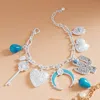 Fashnzfab Western Cactus Pearl Heart Metal Flower Key Crescent Charm Station Bracelet Matte Silver In Silver