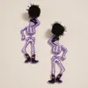 Fashnzfab Western Cowboy Halloween Pom Pom Skeleton Earrings - Purple In Purple