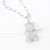 Fashnzfab White Gold Dipped Cz Embellished Metal Bear Pendant Necklace In Multi