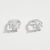 Fashnzfab White Gold Dipped Cz Floral Stone Mini Huggie Hoop Earrings - Silver In Silver