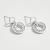 Fashnzfab White Gold Dipped Cz Stone Paved Hoop Link Drop Earrings - Silver In Silver