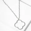 Fashnzfab White Gold Dipped Cz Stone Paved Open Quatrefoil Pendant Necklace In Silver