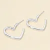 Fashnzfab White Gold Dipped Heart Hoop Earrings In Silver