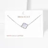 Fashnzfab White Gold Dipped Mother Of Pearl Quatrefoil Charm Bracelet - Rhodium In Multi