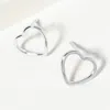Fashnzfab White Gold Dipped Open Heart Stud Earrings In Metallic