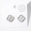 Fashnzfab White Gold Dipped Quatrefoil Stud Earrings - Rhodium, White In Metallic