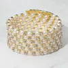 Fashnzfab Wide Pearl Rhinestone Lined Adjustable Coil Evening Bracelet Cream, Gold In Multi