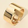 Fashnzfab Wide Statement Metal Cuff Bracelet In Gold