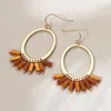 Fashnzfab Wooden Charm Hanging Open Oval Dangle Earrings - Brown In Gold