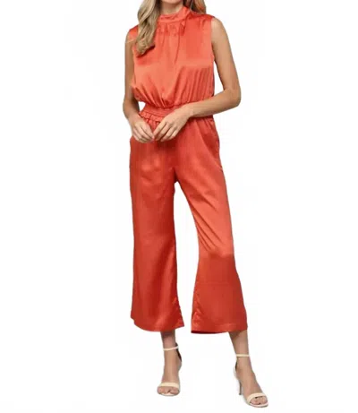 Fate Satin Open Back Romper In Orange In Brown