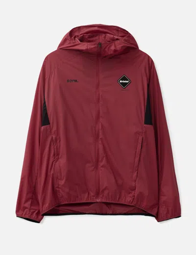 F.c. Real Bristol Light Weight Breathable Packable Hoodie In Brown