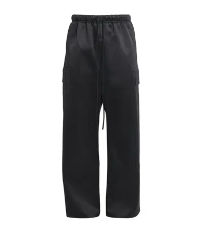 Fear Of God Bonded Satin Cargo Sweatpants In Black