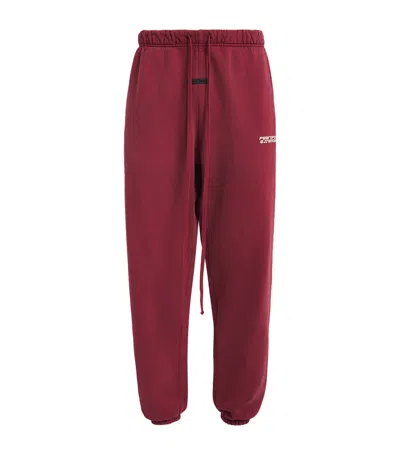 Fear Of God Cuffed Logo Sweatpants In Red