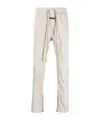 Fear Of God Tapered-leg Drawstring Trousers In White