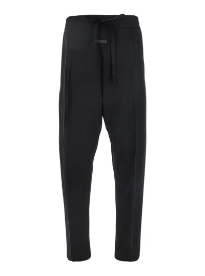 FEAR OF GOD FEAR OF GOD MEN BLACK PANTS WITH FRONT KNOT CLOSURE AND LOGO PATCH IN COTTON AND WOOL BLEND WOMAN