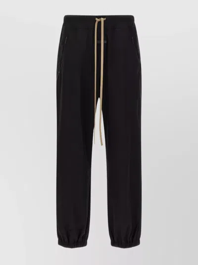 FEAR OF GOD ELASTIC WAISTBAND TRACKPANT JOGGERS WITH SIDE ZIP POCKETS