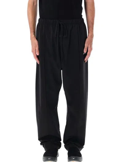 FEAR OF GOD ESSENTIAL FEAR OF GOD ESSENTIAL SPORTY NYLON RELAXED FIT TRACK PANT