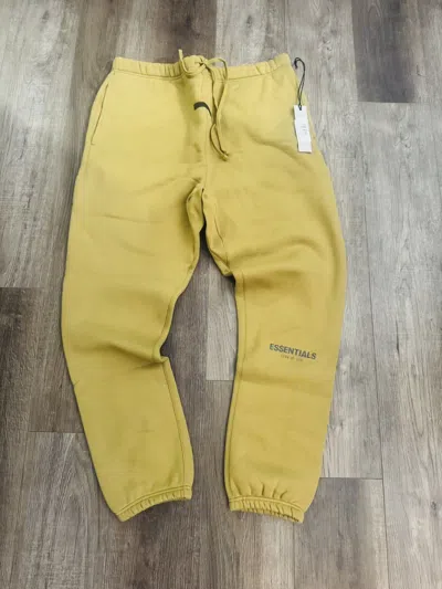 Pre-owned Fear Of God Essentials Cotton Sweatpants In Gold