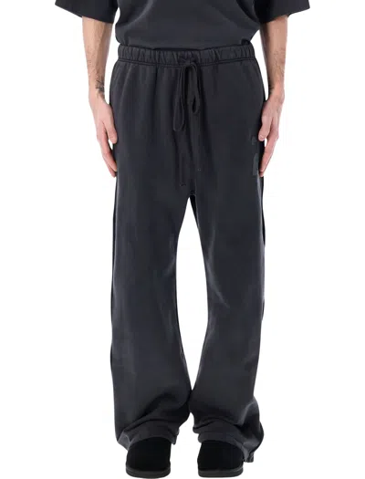 Fear Of God Essentials Tearaway Sweatpants In Black