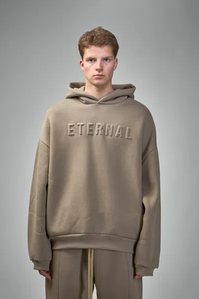 Fear Of God Eternal Logo-embossed Cotton-blend Jersey Hoodie In Brown