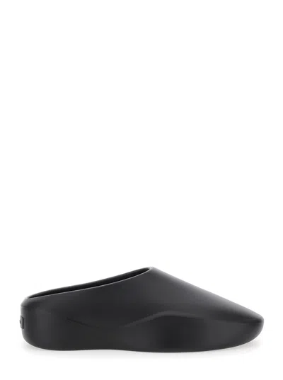 FEAR OF GOD EVA RUNNER BLACK SNEAKERS WITH LOGO ON THE HEEL AND SIDE CUT-OUT DETAIL IN PLASTIC MAN