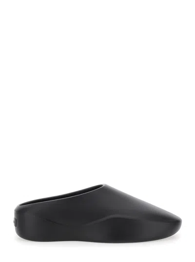 FEAR OF GOD FEAR OF GOD 'EVA RUNNER' BLACK SNEAKERS WITH LOGO ON THE HEEL AND SIDE CUT-OUT DETAIL IN PLASTIC MAN