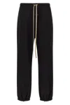 Fear Of God Elastic Waistband Trackpant Joggers With Side Zip Pockets In Black
