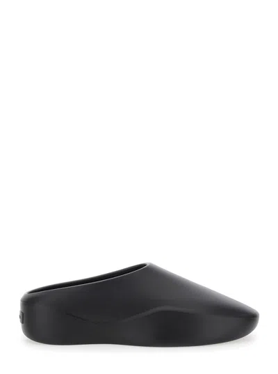 FEAR OF GOD 'EVA RUNNER' BLACK SNEAKERS WITH LOGO ON THE HEEL AND SIDE CUT-OUT DETAIL IN PLASTIC MAN
