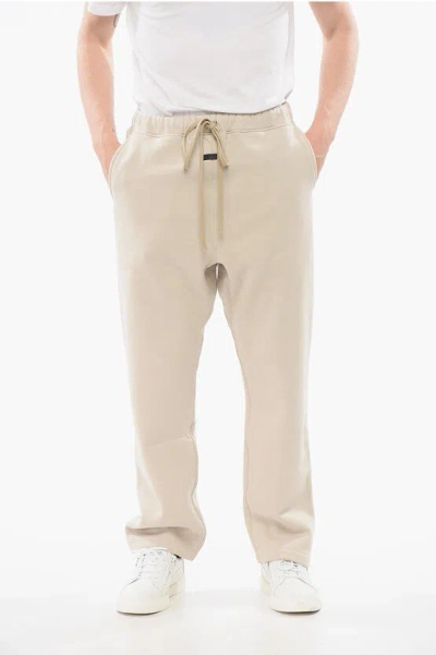 Fear Of God Solid Color Cotton Joggers With Contrasting Logo Patch In Neutral