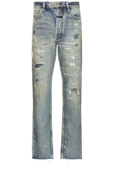 Fear Of God Straight 5 Pocket In Repaired Vintage Indigo