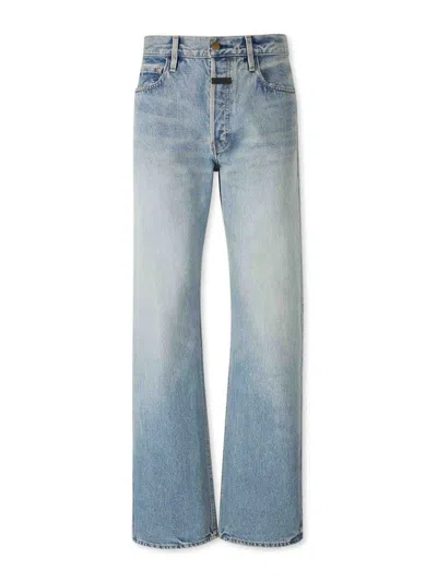 Fear Of God Men Blue Five-pocket Jeans With Front Logo Patch In Denim Man